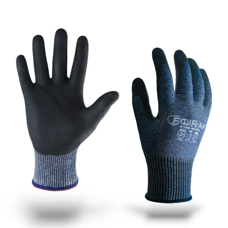 Gants de travail noirs et bleus anti-coupure avec poignets côtelés.