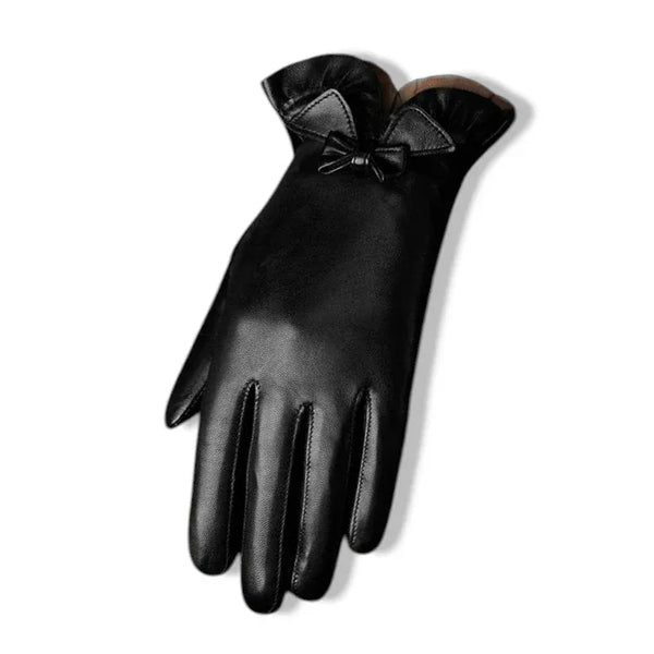 Gants en cuir noir pour femme avec un nœud décoratif.