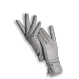 Gants en cuir gris pour femme avec coutures apparentes.