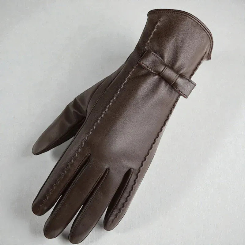 Gants en cuir marron pour femme avec nœud décoratif et technologie tactile.
