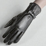 Gants en cuir noir pour femme avec nœud décoratif et technologie tactile.