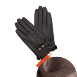 Gants en cuir noir pour homme avec boucle de serrage.