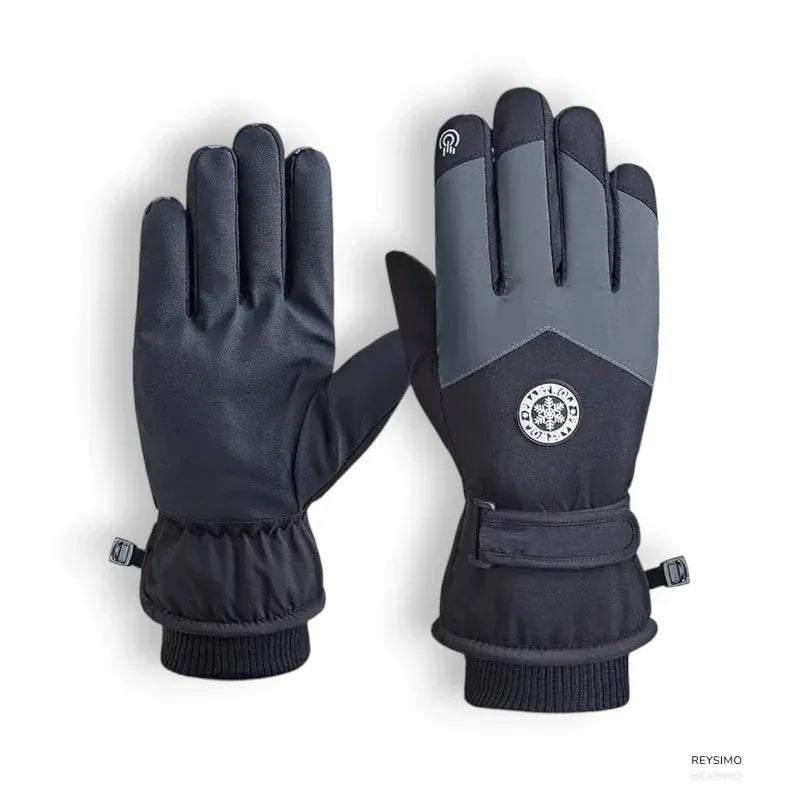 Gants de ski noirs avec logo flocon et détails gris.