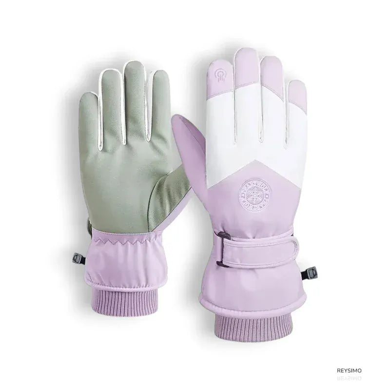 Gants de ski roses pour femmes avec motif flocon.