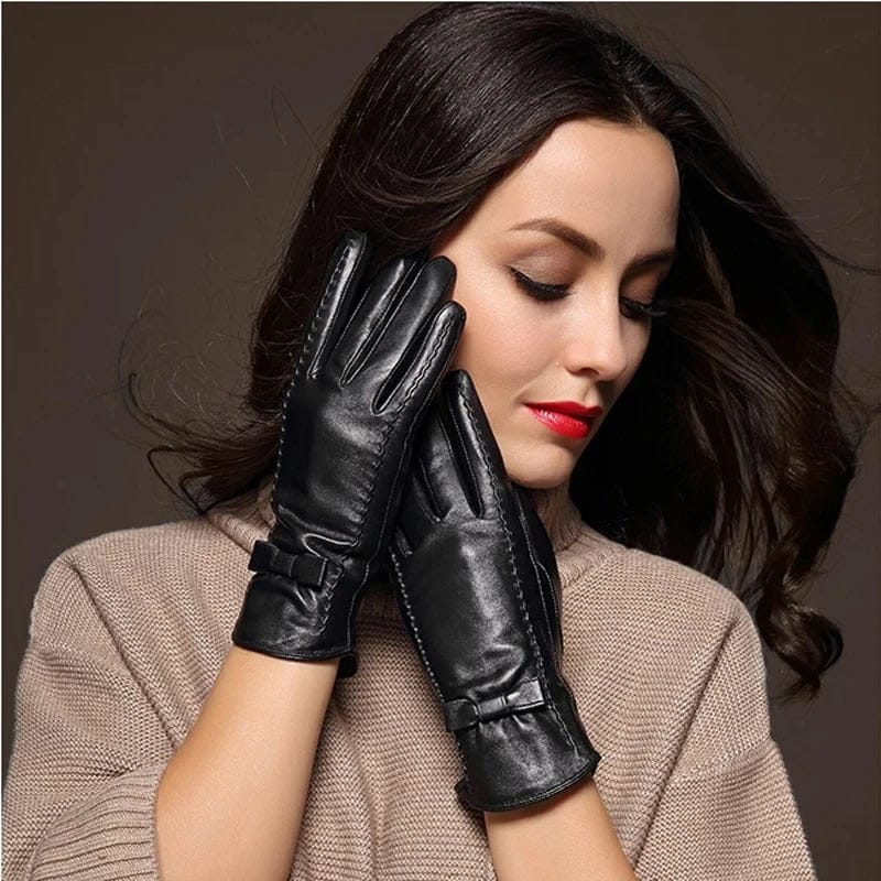 Gants en cuir noir pour femme avec nœud et technologie tactile.