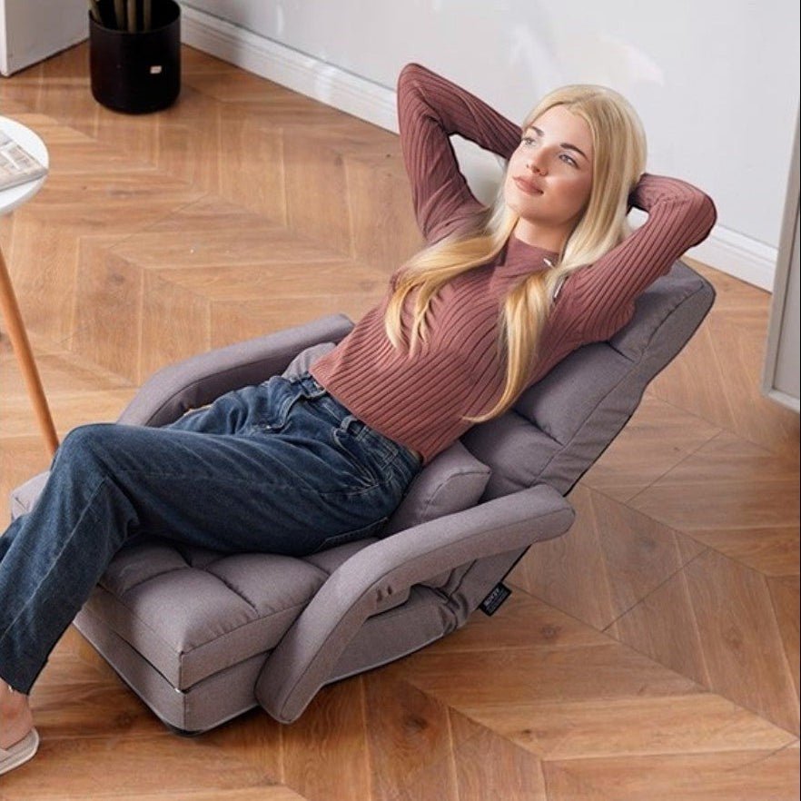 Fauteuil de sol avec accoudoirs convertible en lit - REYSIMO