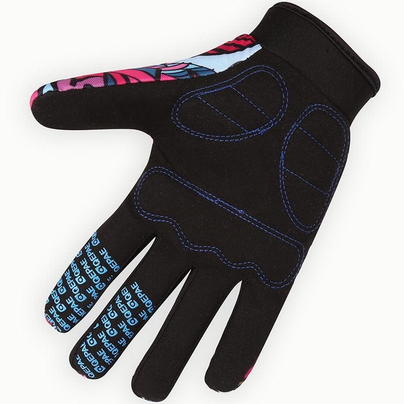 Gants VTT femmes noirs avec motifs colorés sur les doigts et coutures bleues.