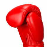 Gant de boxe rouge en cuir synthétique pour homme ou femme.