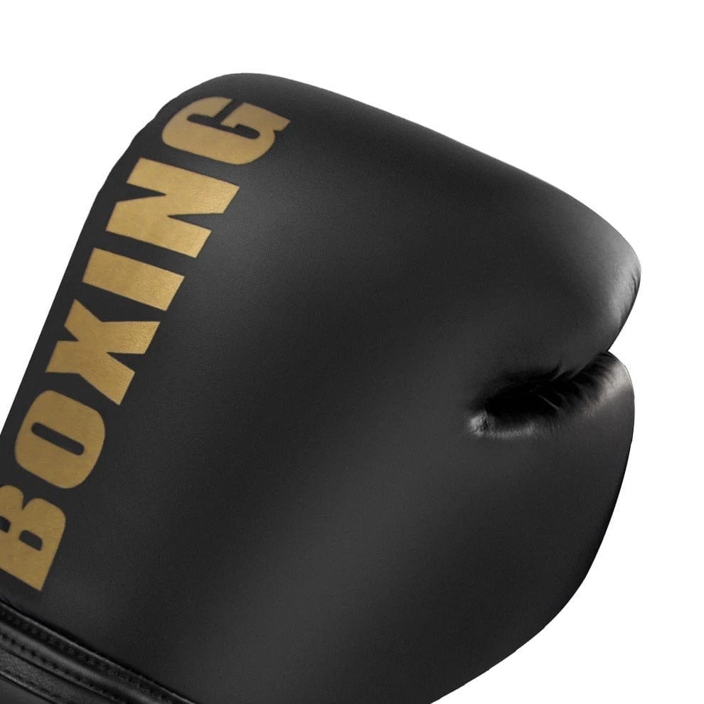 Gant de boxe noir avec inscription dorée "BOXING".