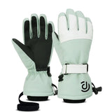 Gants de ski verts et blancs avec doublure polaire et logo.